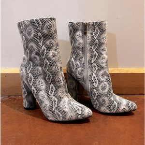Snake skin heeled boots